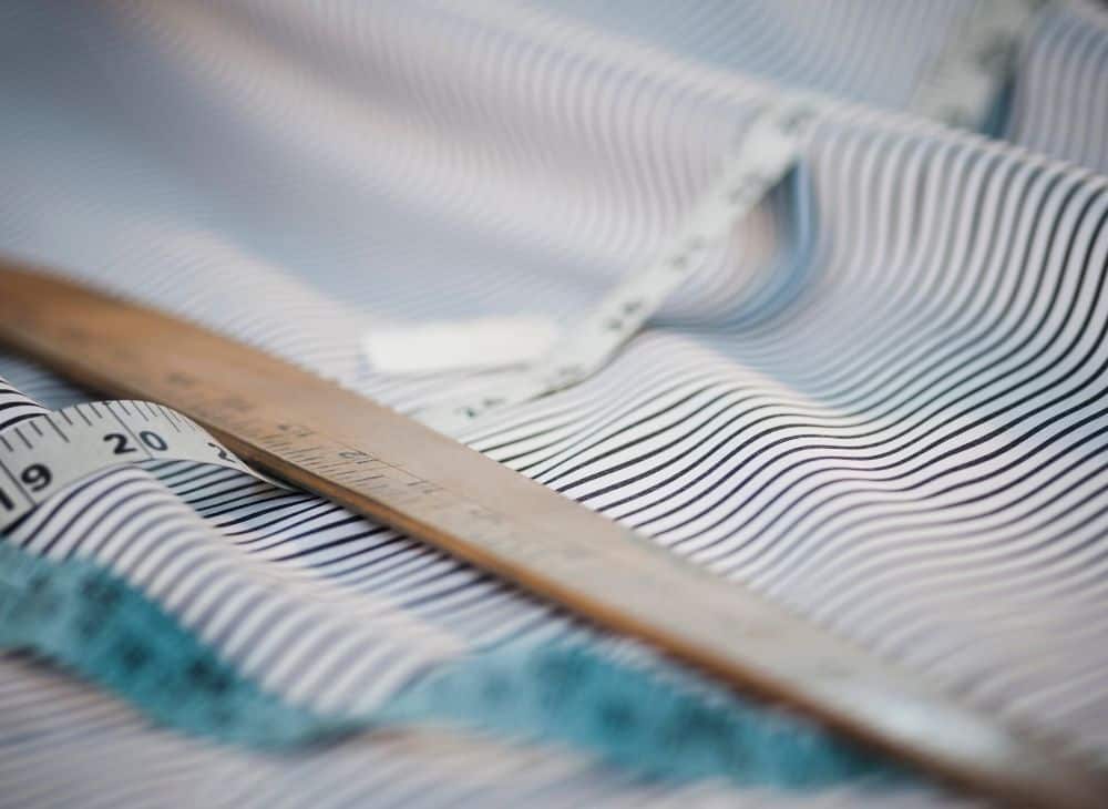 Fabric rolls and measuring tape — garments and textiles sourcing